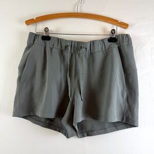 Lululemon On The Fly Shorts Woven 2.5" Green Sage Casual Mid Rise Womens Size 12